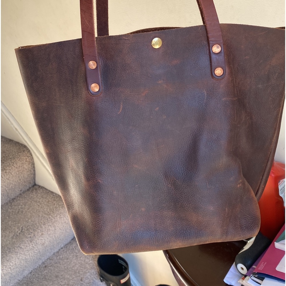 KMM brown kodiak leather tote 10” straps and snap